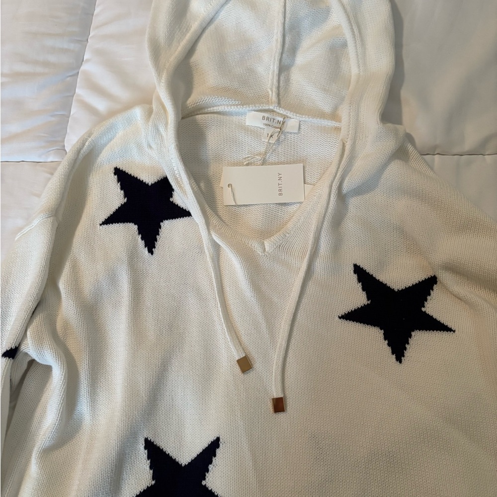 White Hoodie with Blue Star Accents